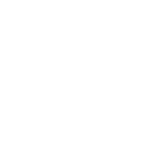 An arborist wearing a white helmet and safety gear, scaling a tall tree with a chainsaw in a residential area.